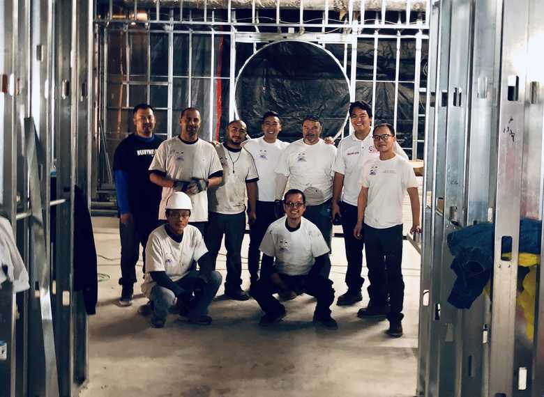 Team at a retail buildout
