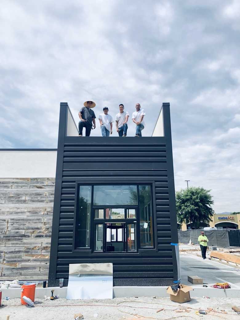 Team at a commercial storefront